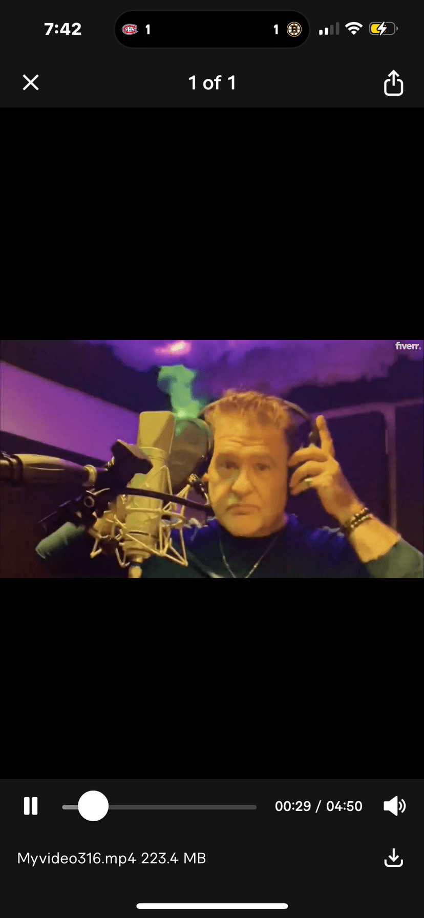 JC Grigg podcast recording studio with professional microphone and purple lighting